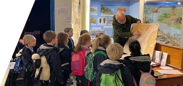 School children learning about fossils at the Shipwreck museum